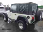 1999 Jeep Wrangler SE with VIN 1J4FY29P2XP461923, listed as a IAAI auction lot 43591392 with 198,022 mi miles and . Bid and sale history available at DreamBid. Image 3.
