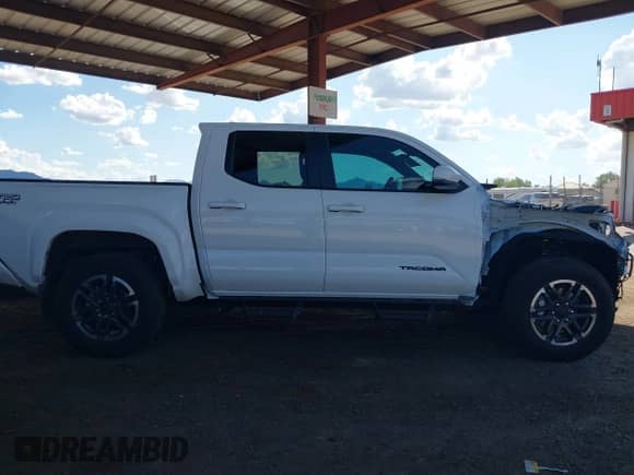 2024 Toyota Tacoma SR5 with VIN 3TMLB5JN2RM050911, listed as a IAAI auction lot 43169415 with 19,000 mi miles and . Bid and sale history available at DreamBid. Image 14.