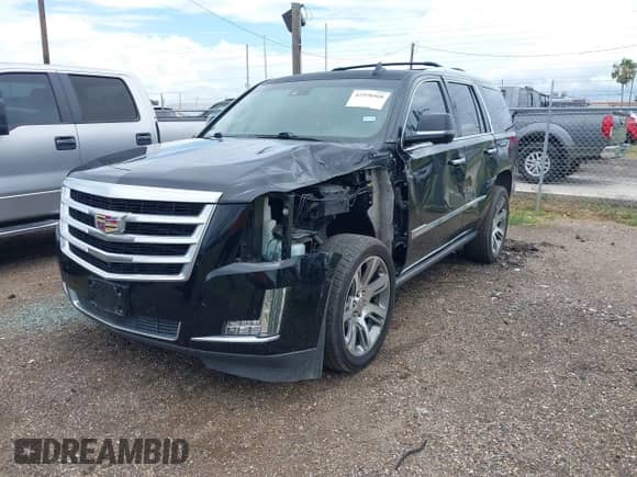 2015 Cadillac Escalade Premium с VIN 1GYS3NKJ7FR667178, выставлен на аукционе IAAI как лот 42558568 с пробегом 76 115 миль миль и . История ставок и продаж доступна на DreamBid. Изображение 2.