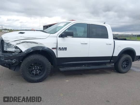 2018 Ram 1500 Rebel with VIN 1C6RR7YT8JS150942, listed as a IAAI auction lot 42168638 with 99,060 mi miles and . Bid and sale history available at DreamBid. Image 14.