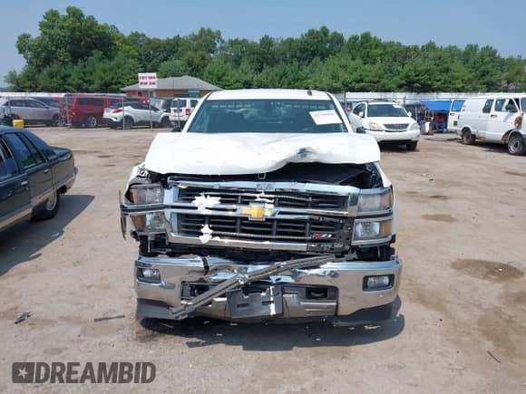 2014 Chevrolet Silverado 1500 LT z VIN 3GCUKREC2EG501235, wystawiony jako IAAI lot #42715436 z przebiegiem 164 781 mil mil oraz . Historia ofert i sprzedaży dostępna na DreamBid. Obrazek 12.