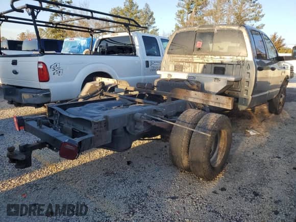 2009 Dodge RAM with VIN 3D6WH48L69G542375, listed as a Copart auction lot 43313455 with 439,372 mi miles and Salvage title. Bid and sale history available at DreamBid. Image 3.