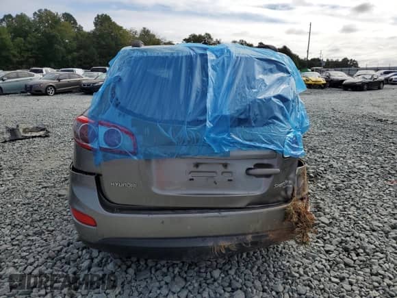 2011 Hyundai Santa Fe GLS z VIN 5XYZGDAB0BG082044, wystawiony jako Copart lot #80025475 z przebiegiem Nie podano mil oraz Szkoda całkowita • Salvage title. Historia ofert i sprzedaży dostępna na DreamBid. Obrazek 6.