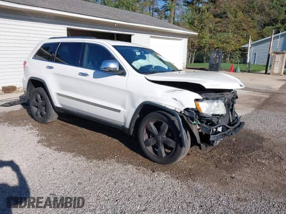 2012 Jeep Grand Cherokee Limited z VIN 1C4RJFBGXCC342513, wystawiony jako IAAI lot #43416360 z przebiegiem 173 799 mil mil oraz . Historia ofert i sprzedaży dostępna na DreamBid. Obrazek 1.