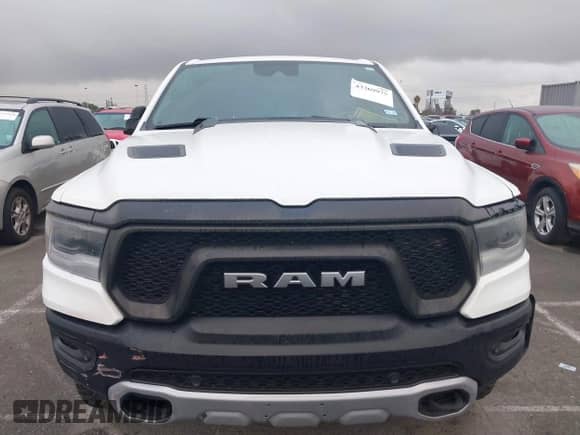 2022 Ram 1500 Rebel z VIN 1C6SRFLT4NN282636, wystawiony jako IAAI lot #43369975 z przebiegiem 38 884 mil mil oraz . Historia ofert i sprzedaży dostępna na DreamBid. Obrazek 12.