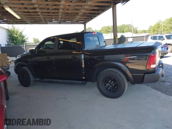 2018 Ram 1500 Rebel with VIN 1C6RR7YT4JS204186, listed as a IAAI auction lot 42668658 with 96,025 mi miles and . Bid and sale history available at DreamBid. Image 14.