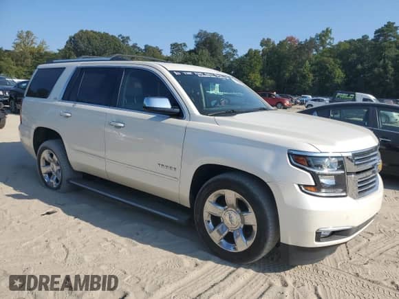 2015 Chevrolet Tahoe LTZ с VIN 1GNSKCKC5FR194824, выставлен на аукционе Copart как лот 71463875 с пробегом 169 679 миль миль и Списание • Salvage title. История ставок и продаж доступна на DreamBid. Изображение 4.