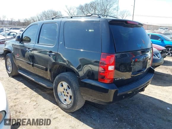 2012 Chevrolet Tahoe LT with VIN 1GNSCBE01CR320553, listed as a IAAI auction lot 41643363 with 270,271 mi miles and . Bid and sale history available at DreamBid. Image 3.