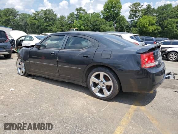 2010 Dodge Charger R/T с VIN 2B3CA5CT3AH172325, выставлен на аукционе Copart как лот 63321335 с пробегом 257 870 миль миль и Списание • Salvage title. История ставок и продаж доступна на DreamBid. Изображение 2.