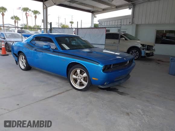 2009 Dodge Challenger R/T z VIN 2B3LJ54T19H633693, wystawiony jako IAAI lot #43471926 z przebiegiem 160 938 mil mil oraz . Historia ofert i sprzedaży dostępna na DreamBid. Obrazek 1.