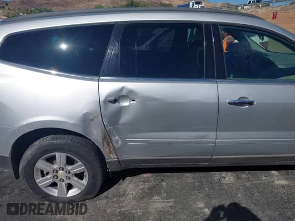 2011 Chevrolet Traverse 1LT with VIN 1GNKVGED4BJ123710, listed as a IAAI auction lot 43348916 with 105,670 mi miles and . Bid and sale history available at DreamBid. Image 6.
