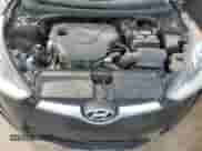 2013 Hyundai Veloster w/Gray Int z VIN KMHTC6AD9DU131253, wystawiony jako Copart lot #80507035 z przebiegiem 179 234 mil mil oraz Szkoda całkowita • Salvage title. Historia ofert i sprzedaży dostępna na DreamBid. Obrazek 11.