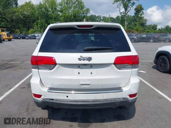 2014 Jeep Grand Cherokee Limited with VIN 1C4RJFBG4EC351033, listed as a IAAI auction lot 42870546 with 194,263 mi miles and . Bid and sale history available at DreamBid. Image 16.