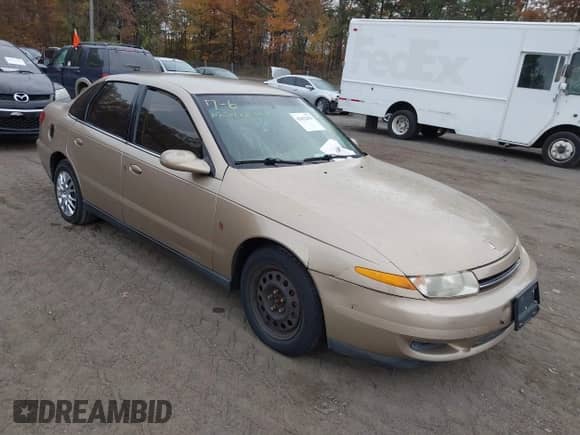 2001 Saturn LS z VIN 1G8JU54F31Y554702, wystawiony jako IAAI lot #43423433 z przebiegiem Nie podano mil oraz . Historia ofert i sprzedaży dostępna na DreamBid. Obrazek 1.