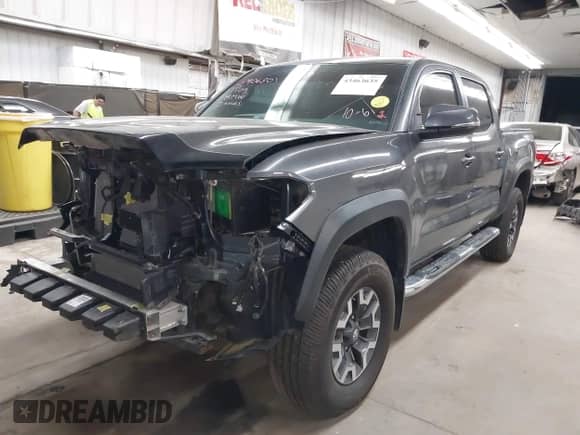2019 Toyota Tacoma TRD Off Road with VIN 3TMCZ5AN2KM194198, listed as a IAAI auction lot 43463635 with 48,375 mi miles and . Bid and sale history available at DreamBid. Image 18.