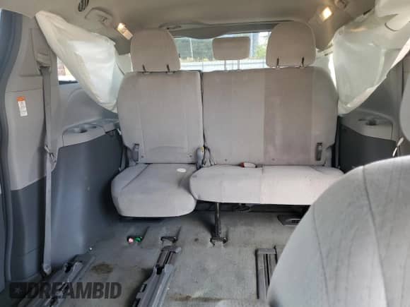 2015 Toyota Sienna LE z VIN 5TDJK3DC6FS124848, wystawiony jako Copart lot #69788815 z przebiegiem 59 412 mil mil oraz Szkoda całkowita • Salvage title. Historia ofert i sprzedaży dostępna na DreamBid. Obrazek 10.