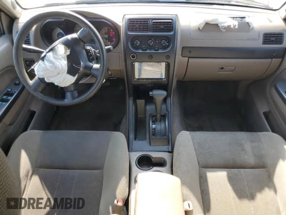 2004 Nissan Frontier XE with VIN 1N6ED27T64C477426, listed as a Copart auction lot 68329535 with 132,259 mi miles and Salvage title. Bid and sale history available at DreamBid. Image 8.