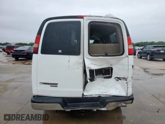2013 Chevrolet Express Passenger LT with VIN 1GAZG1FG4D1137965, listed as a Copart auction lot 59378755 with 115,805 mi miles and Salvage title. Bid and sale history available at DreamBid. Image 6.