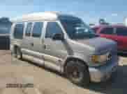 2002 Ford Econoline Cargo Recreational with VIN 1FDRE14L22HB70265, listed as a Copart auction lot 69053235 with 245,320 mi miles and Salvage title. Bid and sale history available at DreamBid. Image 4.