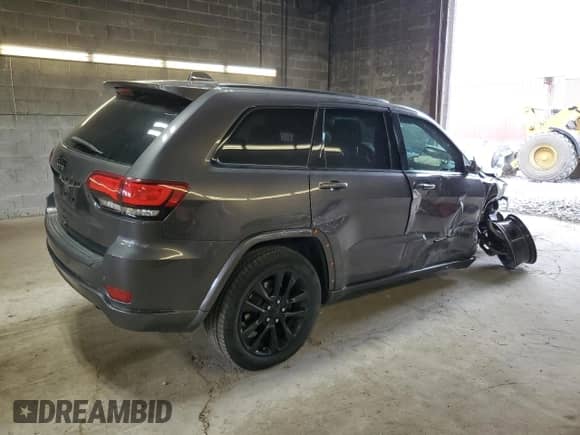 2018 Jeep Grand Cherokee Laredo with VIN 1C4RJFAGXJC487078, listed as a Copart auction lot 63752115 with 69,126 mi miles and Salvage title. Bid and sale history available at DreamBid. Image 3.