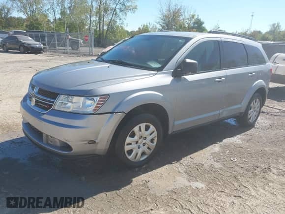 2016 Dodge Journey SE with VIN 3C4PDCAB0GT186088, listed as a IAAI auction lot 43329473 with 169,972 mi miles and . Bid and sale history available at DreamBid. Image 2.