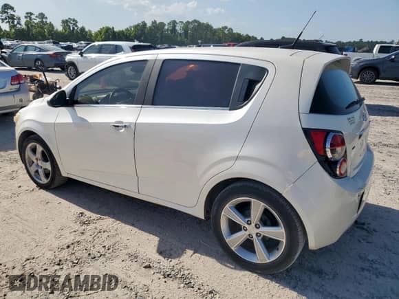 2013 Chevrolet Sonic LTZ с VIN 1G1JE6SB7D4200291, выставлен на аукционе Copart как лот 66943785 с пробегом 126 250 миль миль и Чистый • Clean title. История ставок и продаж доступна на DreamBid. Изображение 2.