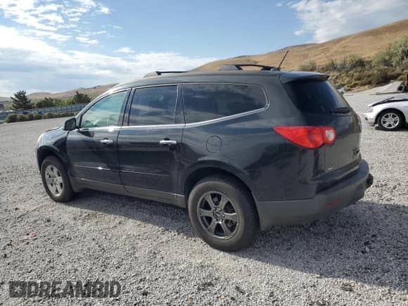 2012 Chevrolet Traverse 1LT z VIN 1GNKVGED6CJ382037, wystawiony jako Copart lot #71263185 z przebiegiem 253 517 mil mil oraz Szkoda całkowita • Salvage title. Historia ofert i sprzedaży dostępna na DreamBid. Obrazek 2.