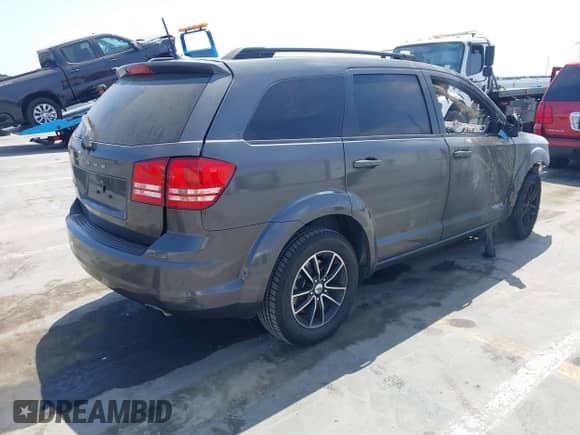 2018 Dodge Journey SE with VIN 3C4PDCAB5JT497376, listed as a IAAI auction lot 42998171 with Not provided miles and . Bid and sale history available at DreamBid. Image 4.