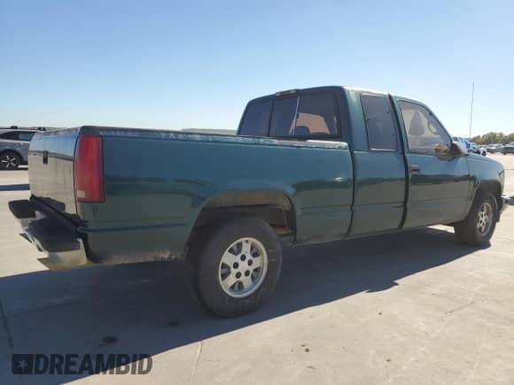 1995 GMC Sierra 1500 with VIN 2GTEC19H9S1560019, listed as a Copart auction lot 79917704 with 259,042 mi miles and Clean title. Bid and sale history available at DreamBid. Image 3.