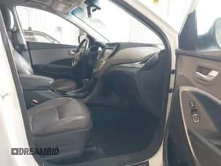 2014 Hyundai Santa Fe z VIN 5XYZUDLB4EG183114, wystawiony jako IAAI lot #43048075 z przebiegiem 121 851 mil mil oraz . Historia ofert i sprzedaży dostępna na DreamBid. Obrazek 5.