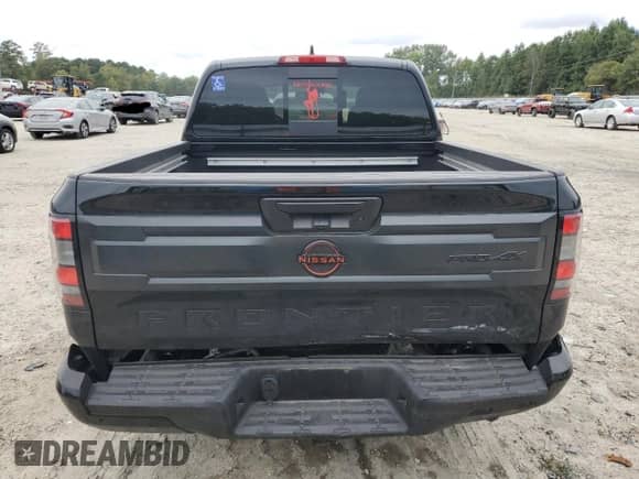 2025 Nissan Frontier Pro-4X with VIN 1N6ED1EK7SN612127, listed as a Copart auction lot 80576445 with 11,489 mi miles and Salvage title. Bid and sale history available at DreamBid. Image 6.