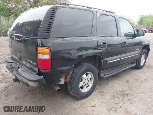 2003 Chevrolet Tahoe LT z VIN 1GNEK13Z43J145919, wystawiony jako IAAI lot #42386094 z przebiegiem 240 118 mil mil oraz . Historia ofert i sprzedaży dostępna na DreamBid. Obrazek 4.