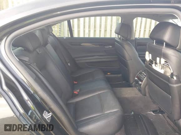 2013 BMW 7 Series 740Li xDrive with VIN WBAYF4C59DD127390, listed as a IAAI auction lot 42083517 with 202,202 mi miles and . Bid and sale history available at DreamBid. Image 8.