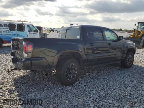 2022 Toyota Tacoma Limited with VIN 3TMGZ5AN8NM506451, listed as a Copart auction lot 56830185 with 58,941 mi miles and Salvage title. Bid and sale history available at DreamBid. Image 3.