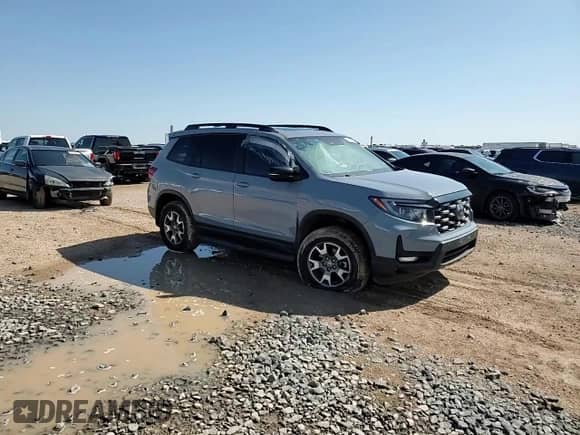 2022 Honda Passport TrailSport z VIN 5FNYF8H65NB021704, wystawiony jako Copart lot #69507175 z przebiegiem 42 578 mil mil oraz Szkoda całkowita • Salvage title. Historia ofert i sprzedaży dostępna na DreamBid. Obrazek 14.