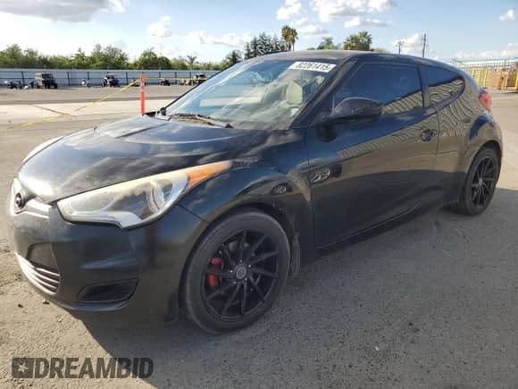 2013 Hyundai Veloster w/Black Int z VIN KMHTC6AD8DU147119, wystawiony jako Copart lot #82261415 z przebiegiem 132 516 mil mil oraz Szkoda całkowita • Salvage title. Historia ofert i sprzedaży dostępna na DreamBid. Obrazek 1.