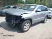 2016 Jeep Grand Cherokee Laredo with VIN 1C4RJFAGXGC338565, listed as a IAAI auction lot 42378371 with 104,037 mi miles and . Bid and sale history available at DreamBid. Image 18.