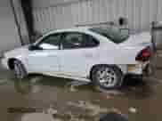 2004 Pontiac Grand Am SE1 with VIN 1G2NF52E84M669999, listed as a Copart auction lot 70597345 with 186,803 mi miles and Salvage title. Bid and sale history available at DreamBid. Image 2.