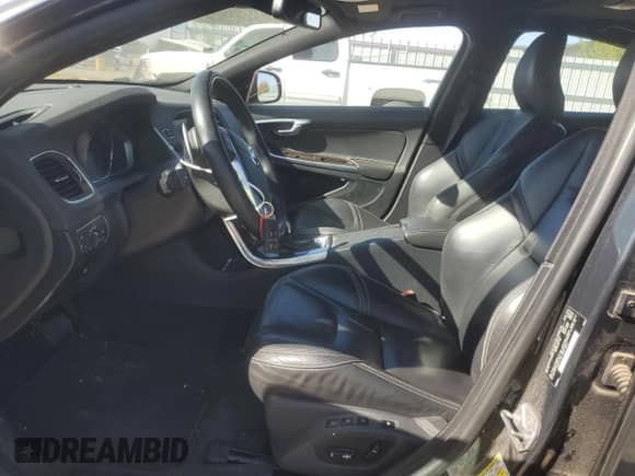 2015 Volvo S60 with VIN YV126MFD0F1309666, listed as a Copart auction lot 77844894 with 130,570 mi miles and Salvage title. Bid and sale history available at DreamBid. Image 7.