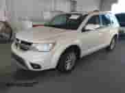 2013 Dodge Journey SXT with VIN 3C4PDCBG5DT588808, listed as a IAAI auction lot 43446932 with 152,278 mi miles and . Bid and sale history available at DreamBid. Image 2.