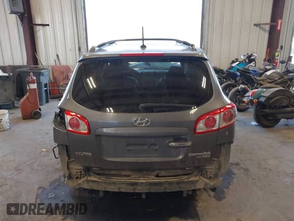 2010 Hyundai Santa Fe Limited z VIN 5NMSKDAG7AH378050, wystawiony jako IAAI lot #42353152 z przebiegiem 132 134 mil mil oraz . Historia ofert i sprzedaży dostępna na DreamBid. Obrazek 16.