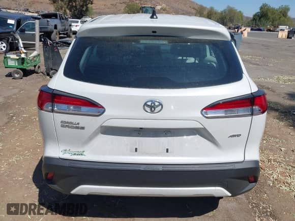 2022 Toyota Corolla Cross L with VIN 7MUAAABG8NV029483, listed as a IAAI auction lot 42687179 with 49,403 mi miles and . Bid and sale history available at DreamBid. Image 16.