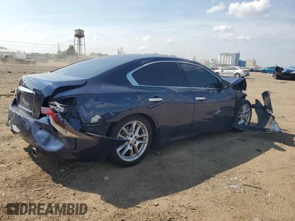 2014 Nissan Maxima SV with VIN 1N4AA5AP3EC452823, listed as a Copart auction lot 68180105 with 84,991 mi miles and Salvage title. Bid and sale history available at DreamBid. Image 3.