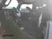 2023 Jeep Wrangler Sport z VIN 1C4GJXAN1PW634889, wystawiony jako Copart lot #48496145 z przebiegiem 15 874 mil mil oraz Szkoda całkowita • Salvage title. Historia ofert i sprzedaży dostępna na DreamBid. Obrazek 7.