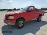 2003 Ford F-150 XL z VIN 1FTRF18223NA52111, wystawiony jako Copart lot #74816344 z przebiegiem 175 021 mil mil oraz Szkoda całkowita • Salvage title. Historia ofert i sprzedaży dostępna na DreamBid. Obrazek 1.
