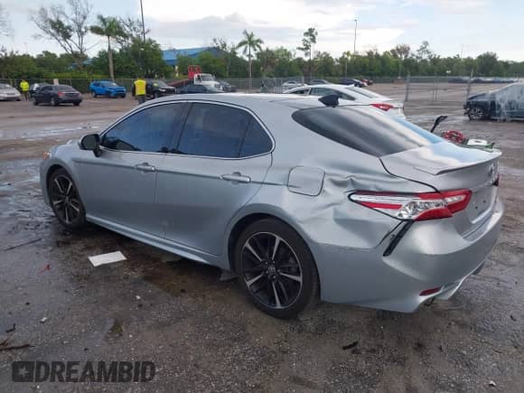 2020 Toyota Camry XSE with VIN 4T1K61AK1LU377328, listed as a IAAI auction lot 43224088 with 48,597 mi miles and . Bid and sale history available at DreamBid. Image 3.
