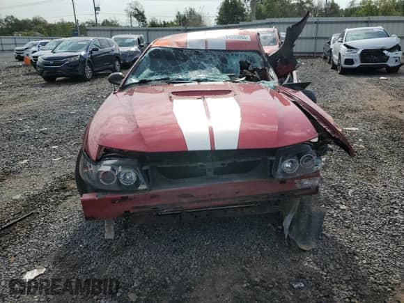 2003 Ford Mustang Standard с VIN 1FAFP40493F325396, выставлен на аукционе Copart как лот 84555065 с пробегом Не указан миль и Списание • Salvage title. История ставок и продаж доступна на DreamBid. Изображение 5.