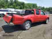 2003 Nissan Frontier SVE with VIN 1N6MD29Y43C411380, listed as a Copart auction lot 64013085 with 95,252 mi miles and Salvage title. Bid and sale history available at DreamBid. Image 3.