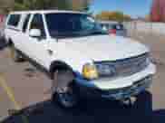 1998 Ford F-150 z VIN 2FTZX1860WCB00134, wystawiony jako IAAI lot #43498351 z przebiegiem 235 031 mil mil oraz . Historia ofert i sprzedaży dostępna na DreamBid. Obrazek 1.