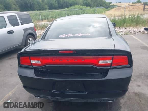 2012 Dodge Charger SE with VIN 2C3CDXBG2CH137983, listed as a IAAI auction lot 42769041 with 128,239 mi miles and . Bid and sale history available at DreamBid. Image 15.